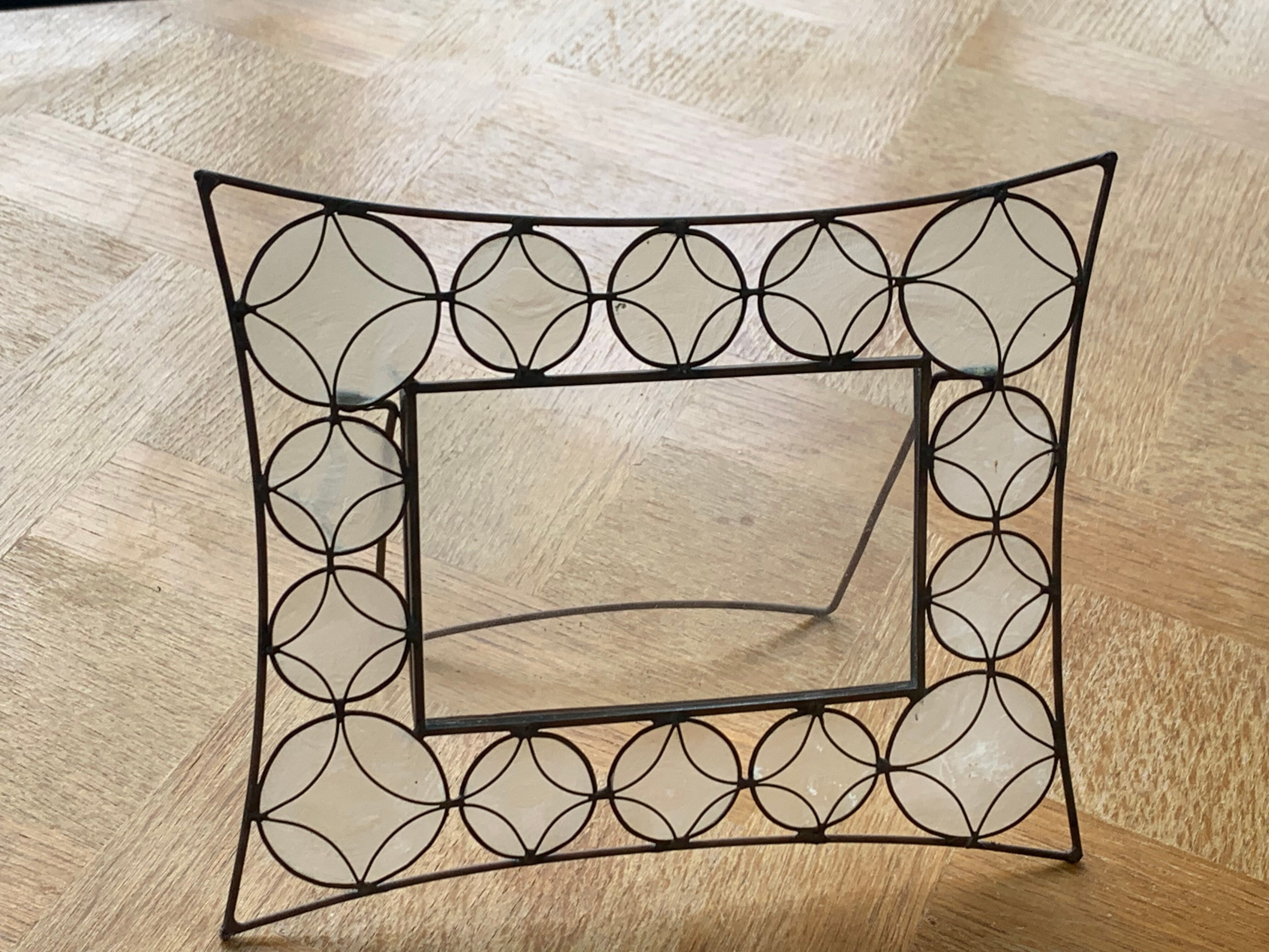 Metal frame and mother-of-pearl design and vintage