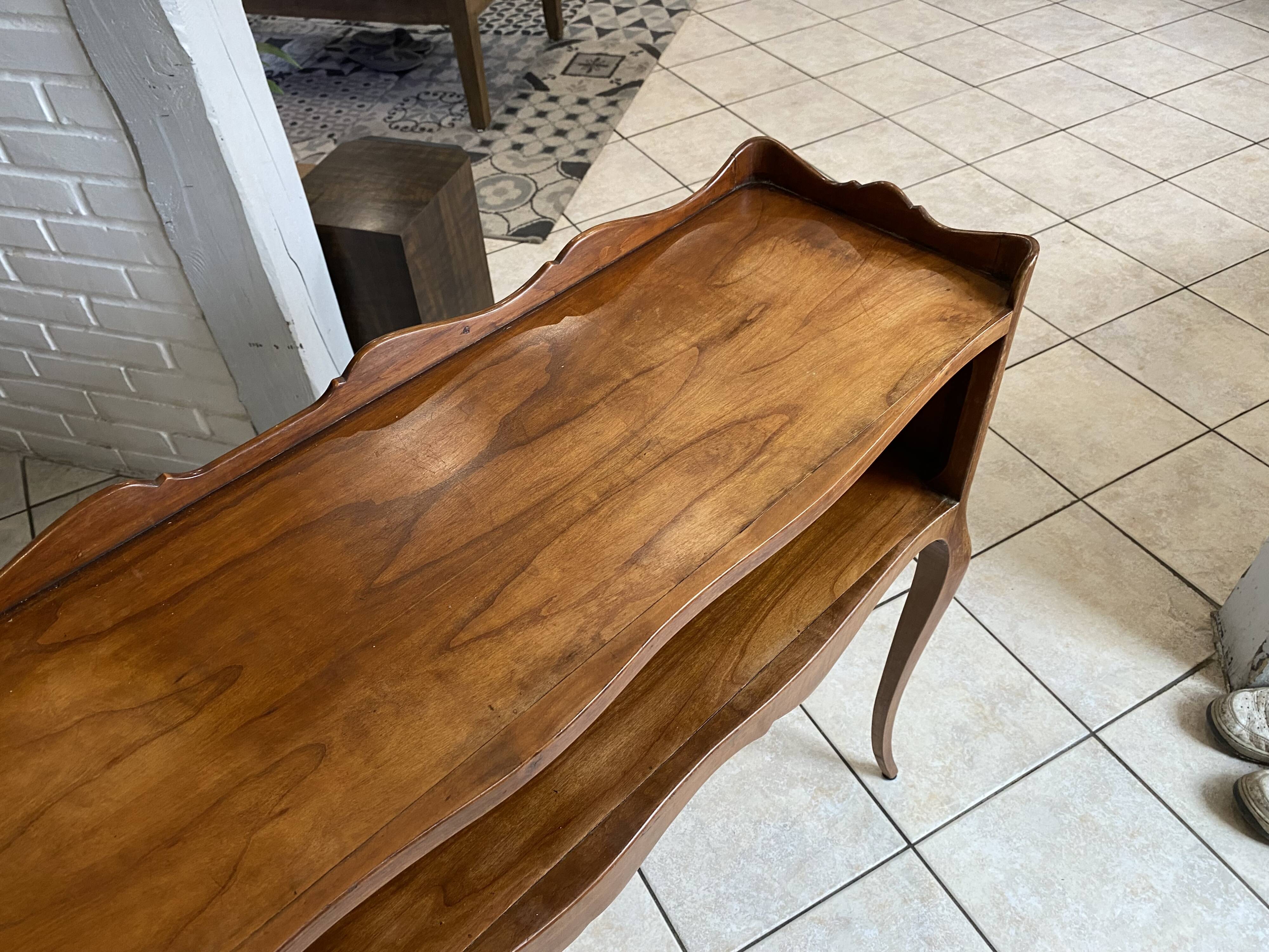 Console with a niche in cherry wood in Louis XV style.