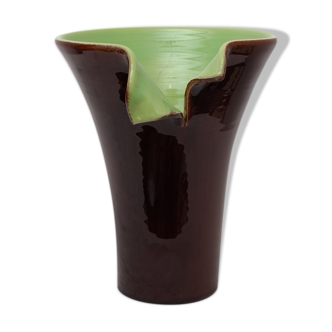 Brown and green vase with open edge rolled up