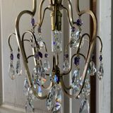 Chandelier with tassels and cage