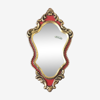 Gold and red mirror brand Deknudt