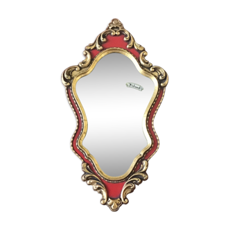 Gold and red mirror brand Deknudt