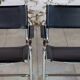 Pair of Bauhaus cantilever armchairs in chromed metal and leather, 1970