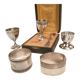 3 shells and 2 silver metal napkin rings