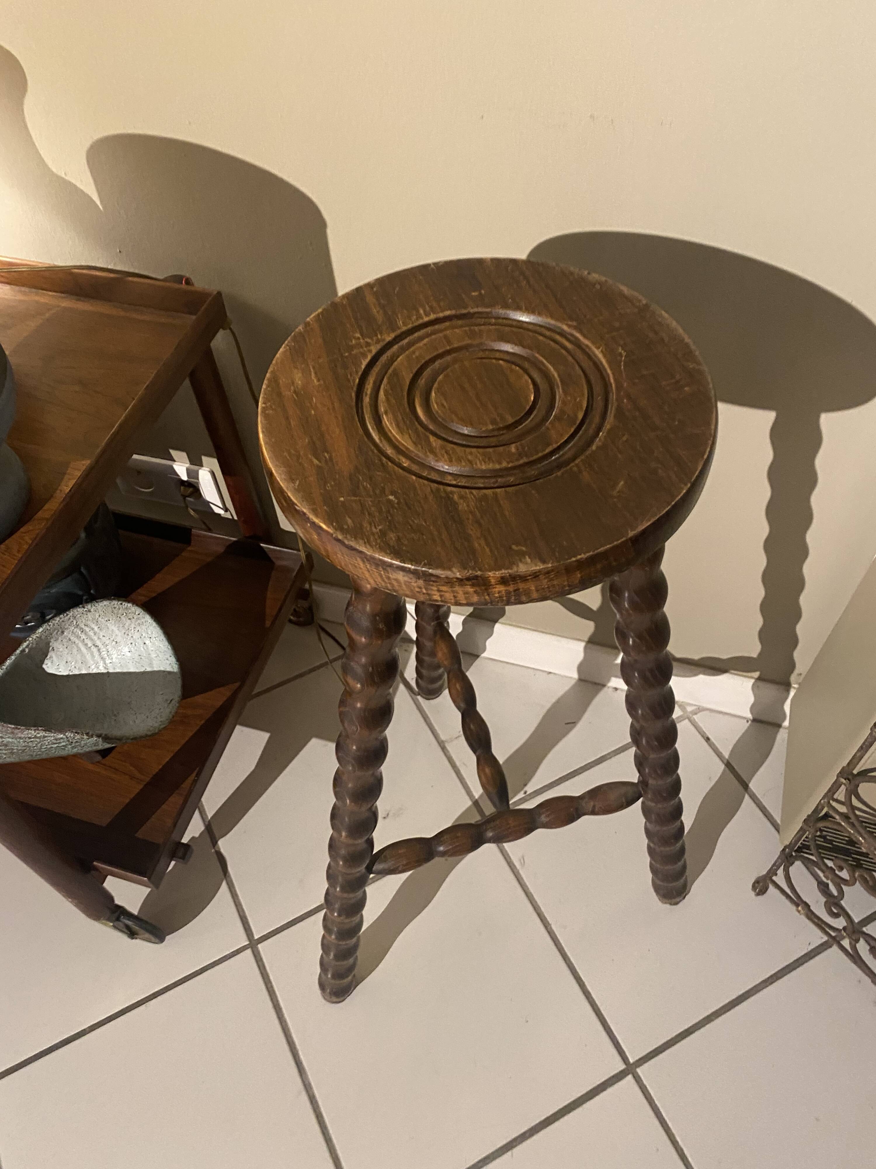 High carved wooden stool