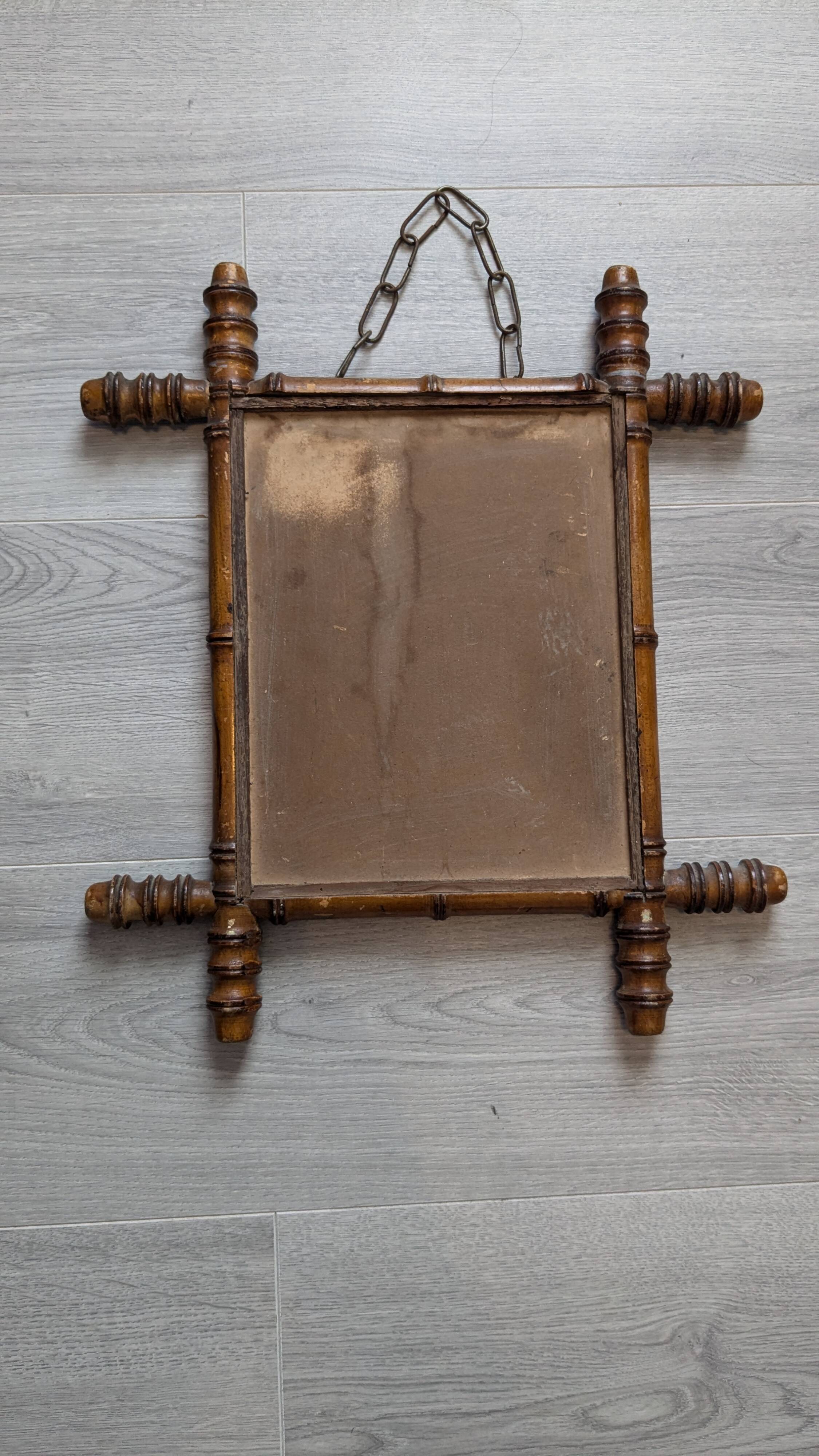 Antique turned bamboo mirror with pitted glass 45x39 cm