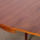 Round extendable dining table in wood, 1960