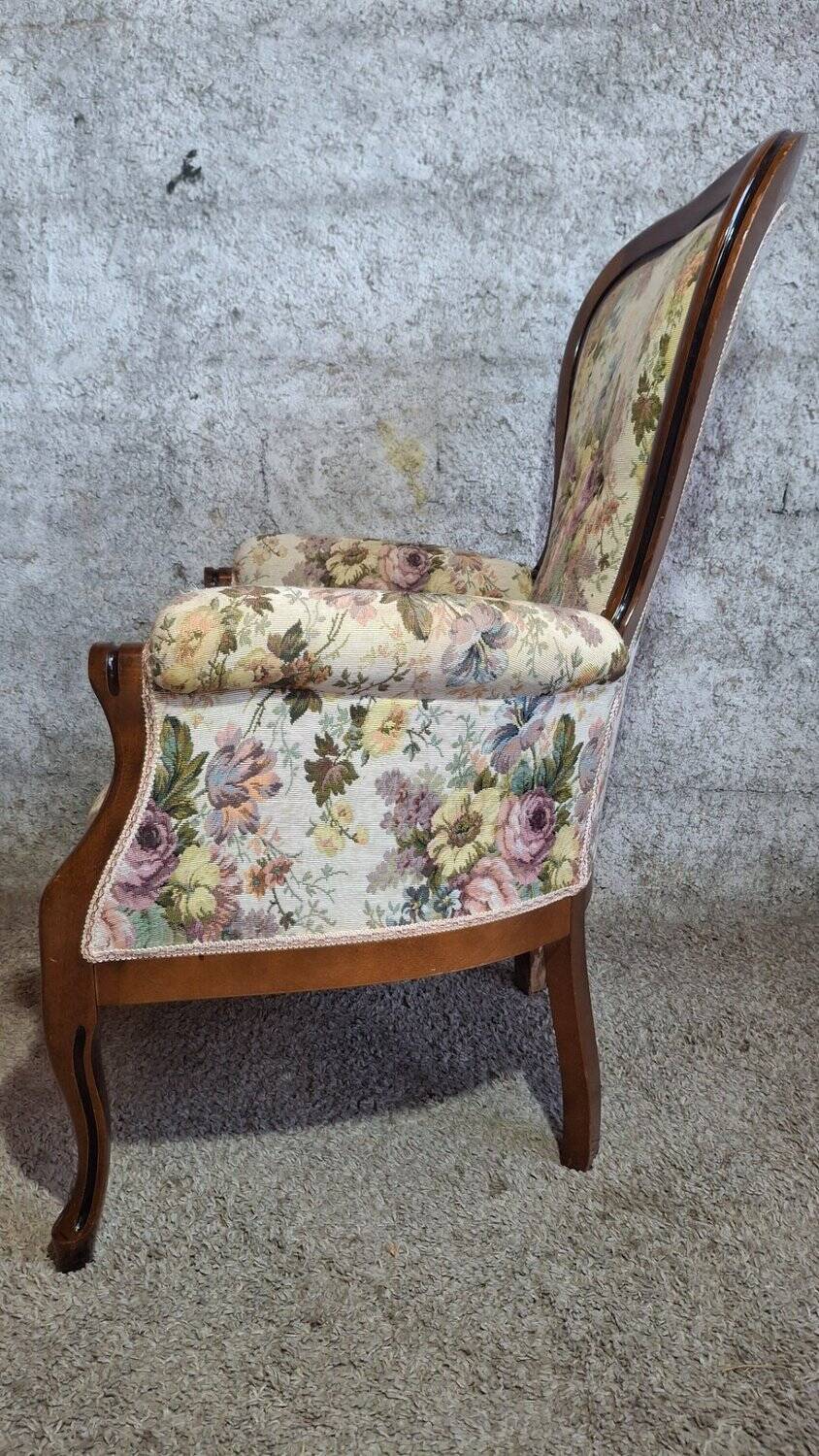 Louis XV style armchair with floral jacquard upholstery.