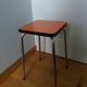 Chrome metal and orange formica stool
