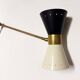 Articulated brass and lacquered iron wall light, 1950s design.
