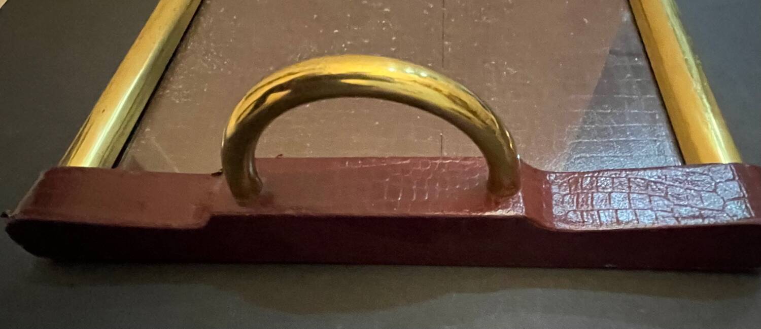 Old leather and gold metal tray