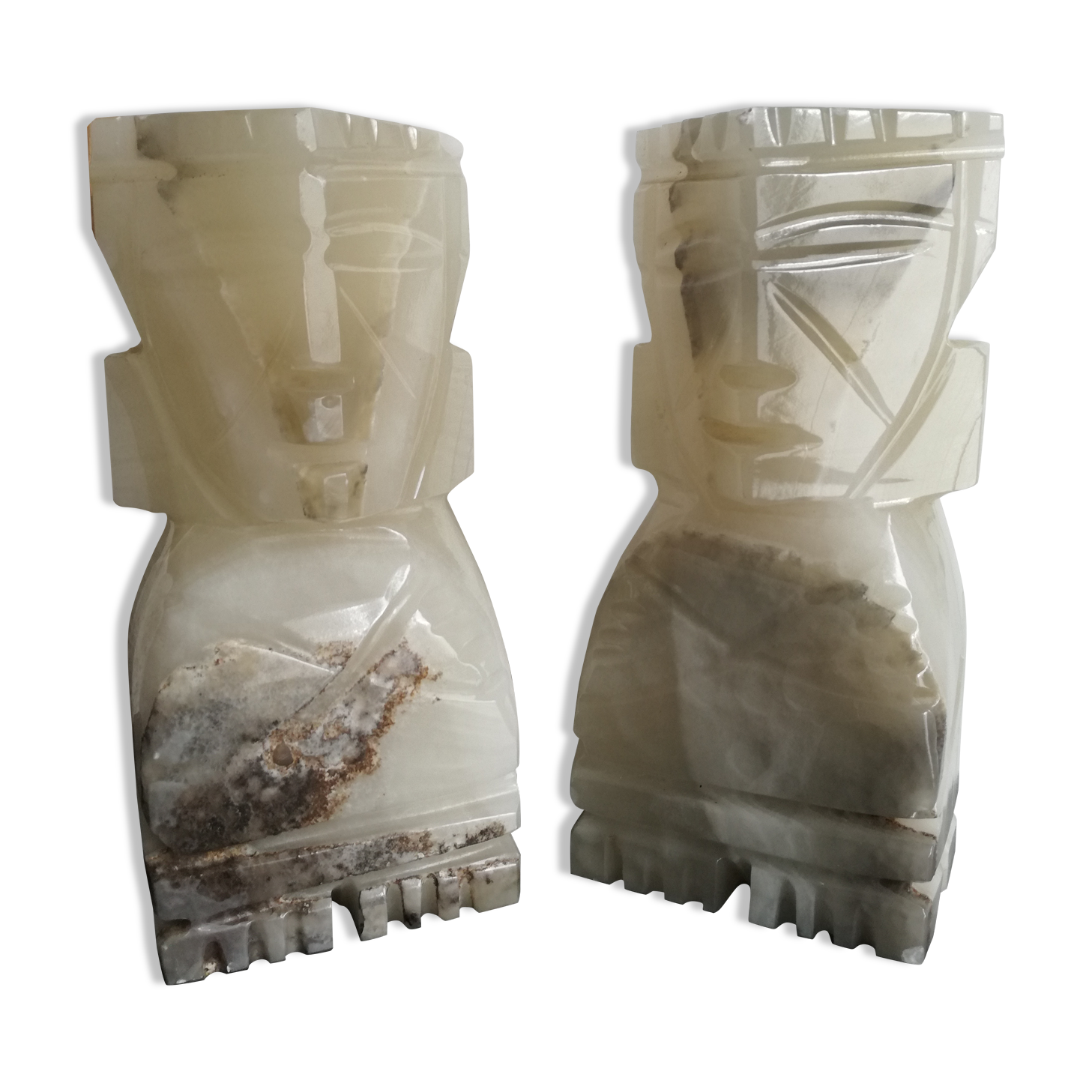 Onyx book clambands depicting an Aztec statue