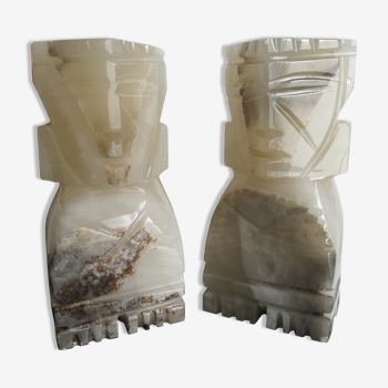 Onyx book clambands depicting an Aztec statue