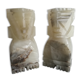 Onyx book clambands depicting an Aztec statue