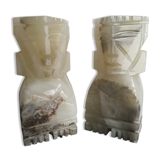 Onyx book clambands depicting an Aztec statue