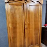 Exceptional Empire period wardrobe in solid walnut, 19th century, circa 1800