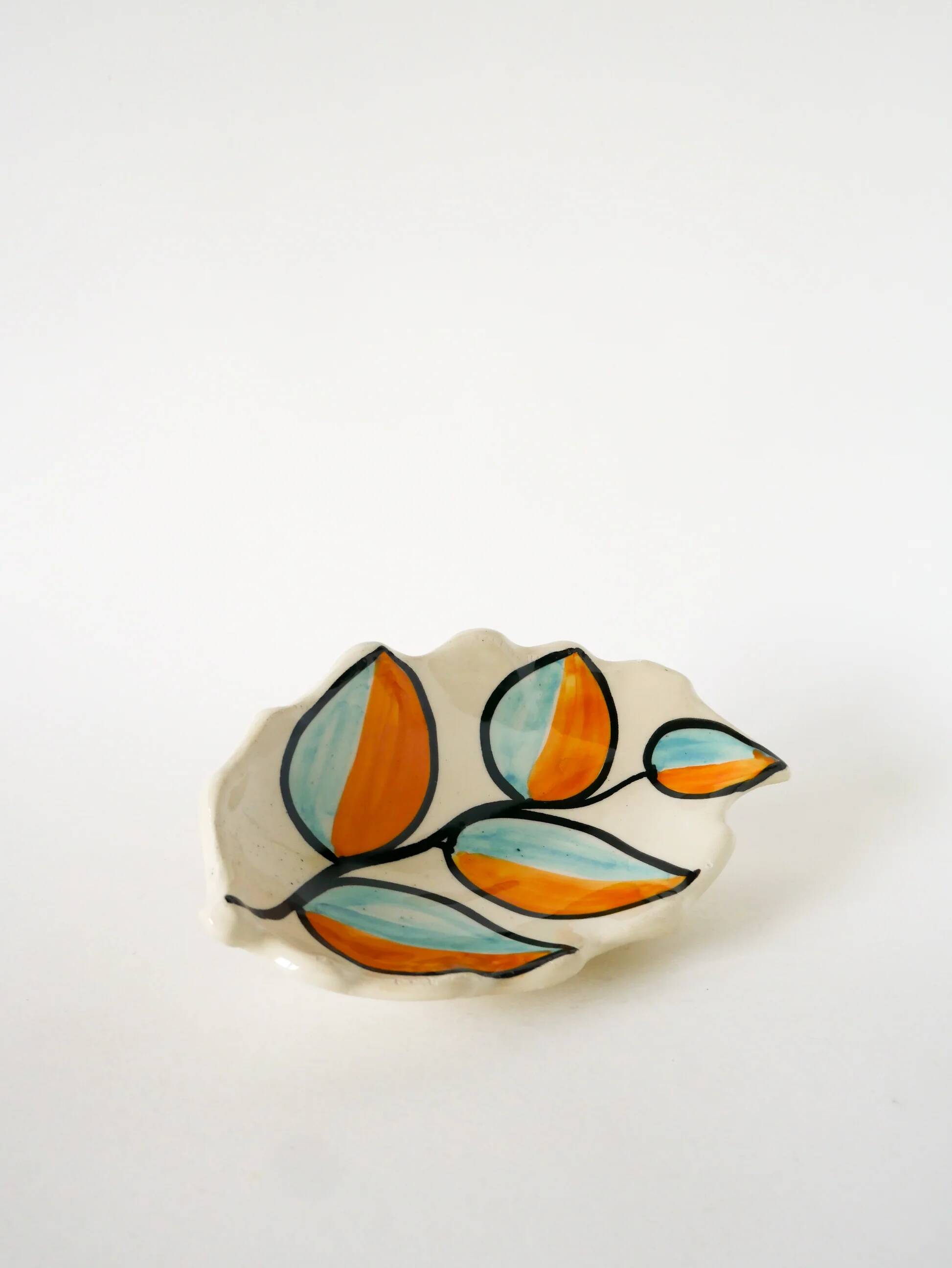 Ceramic catchall, leaf shape, orange and blue, psychedelic, 1970.