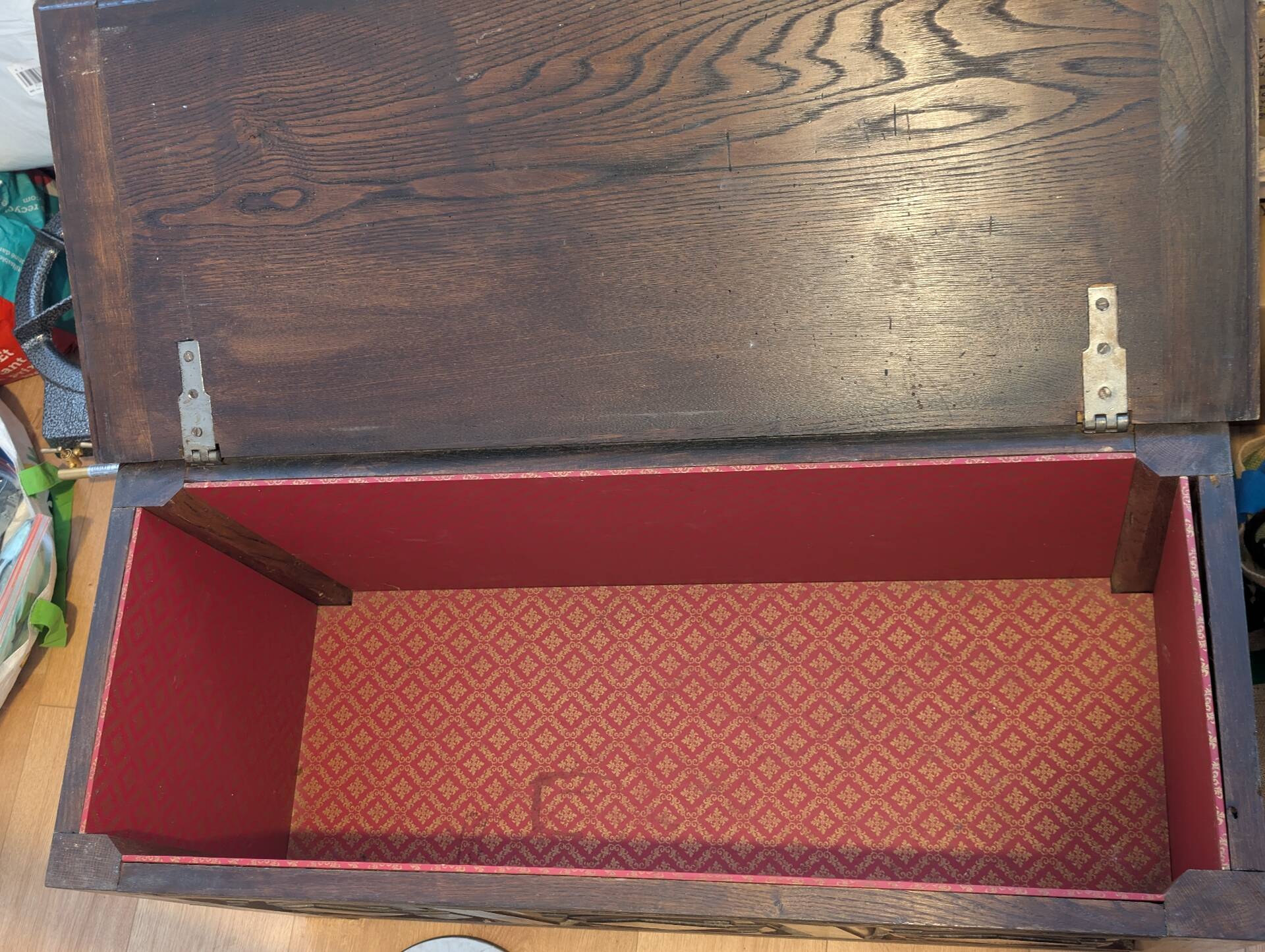 Antique dark wood chest with geometric paneling / pointed detail