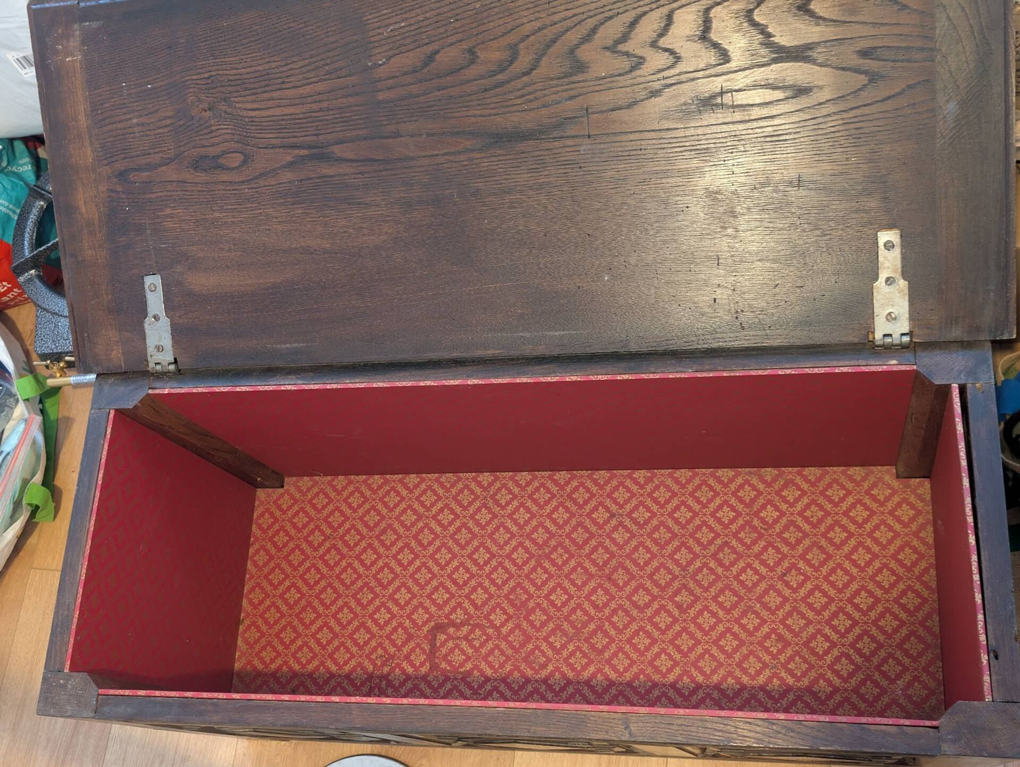 Antique dark wood chest with geometric paneling / pointed