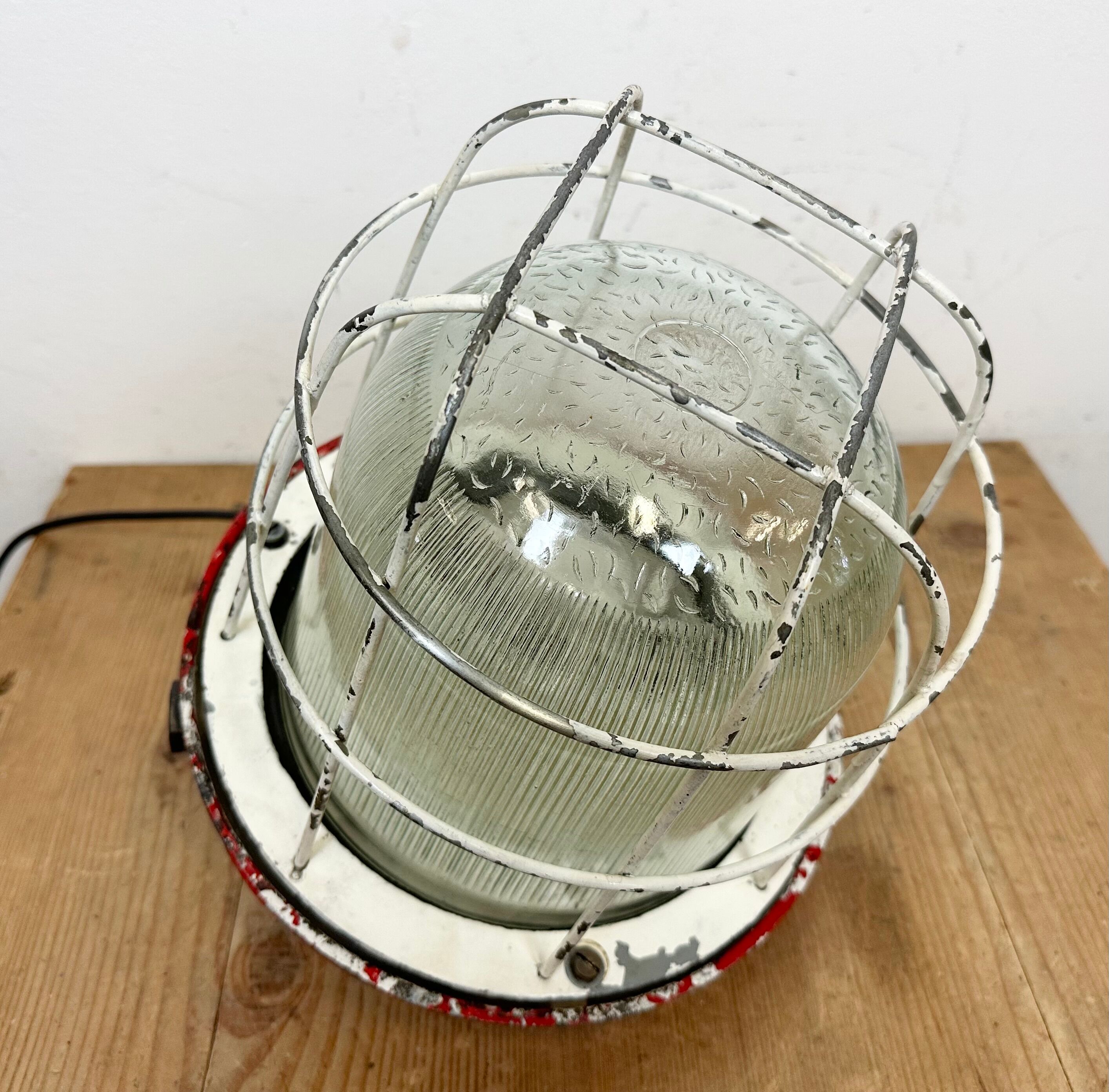 Red industrial cast iron cage pendant light, 1960s