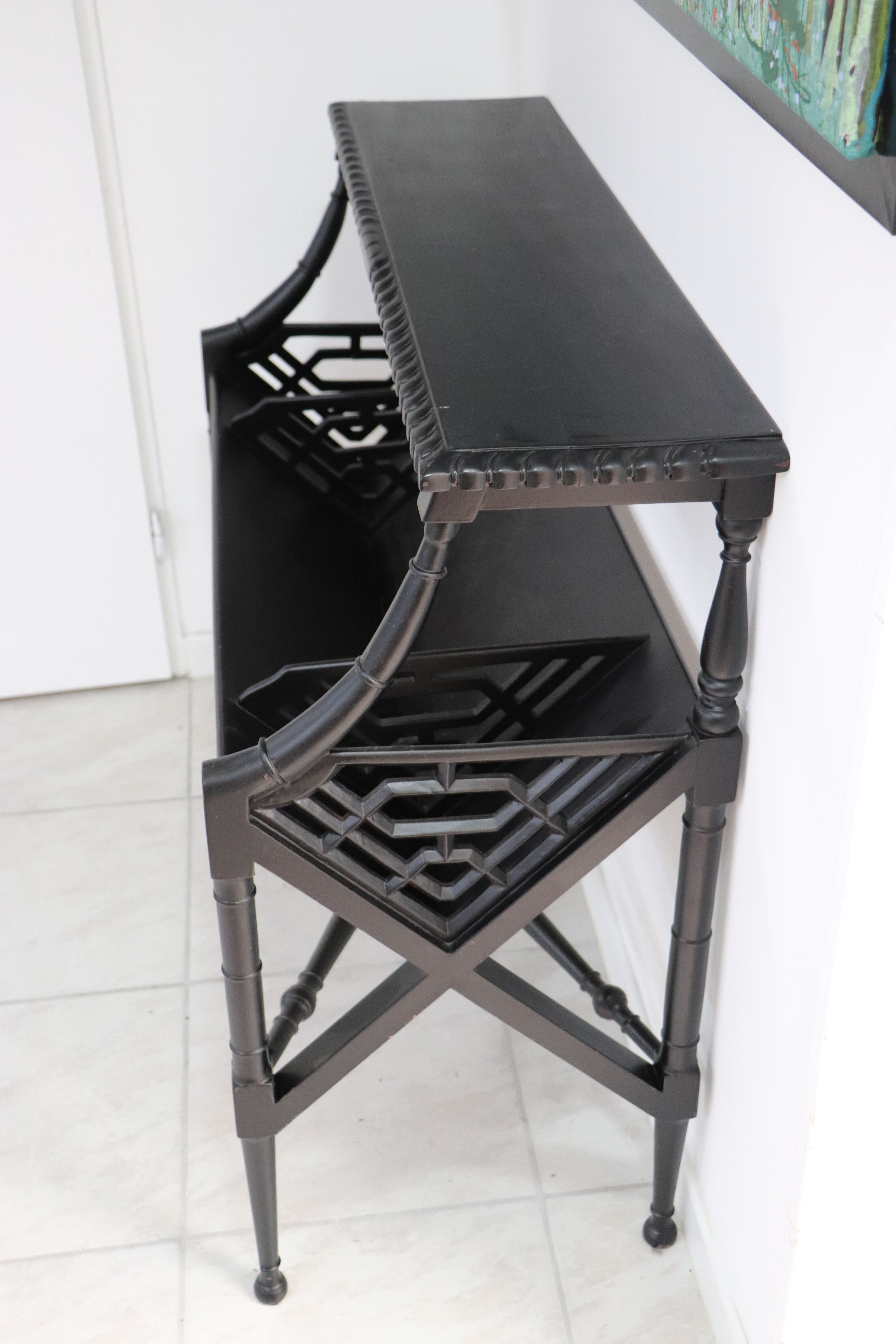 Black lacquered Indochinese console with disk storage