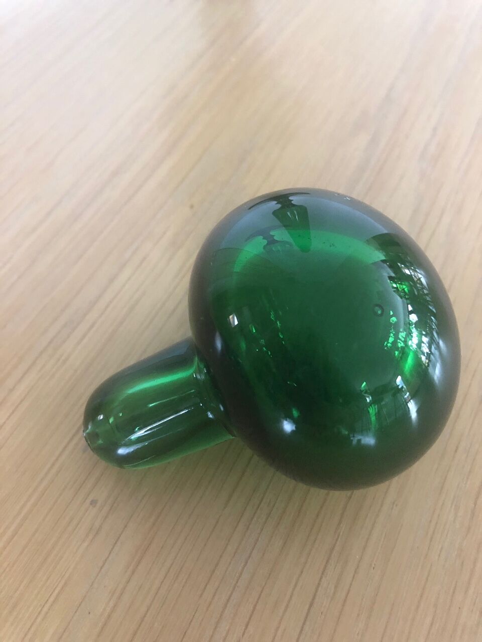 Green glass standing apothecary bottle