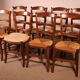 série de 8 chaises paillées en merisier