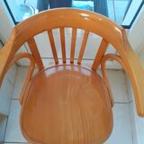 Baumann armchair in light beech. With its label.