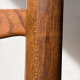 Low fireplace chair attributed to Charles Dudouyt.