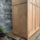 Parisian paneled cabinet in raw wood, 1940