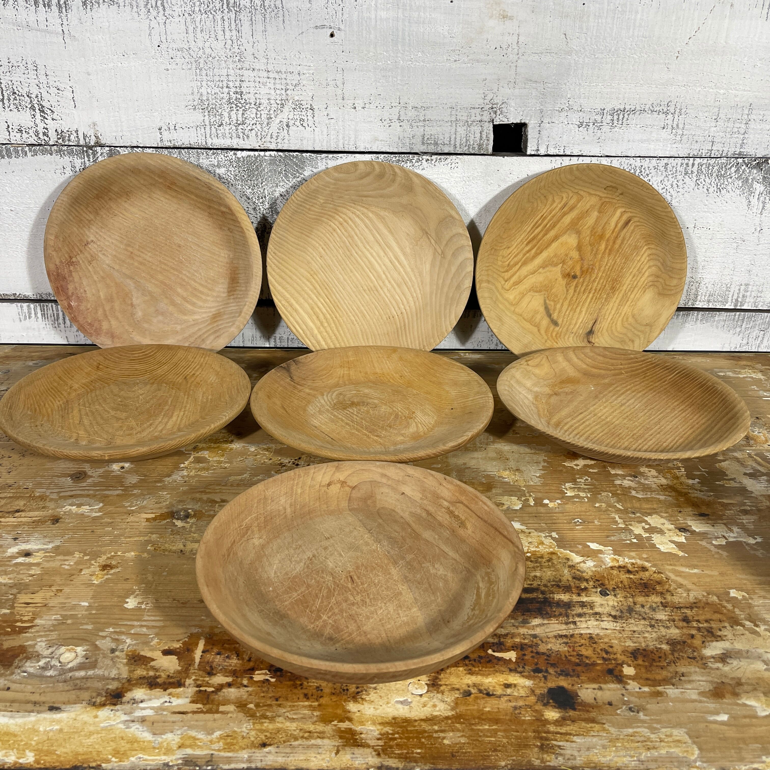 Series of 7 wooden plates
