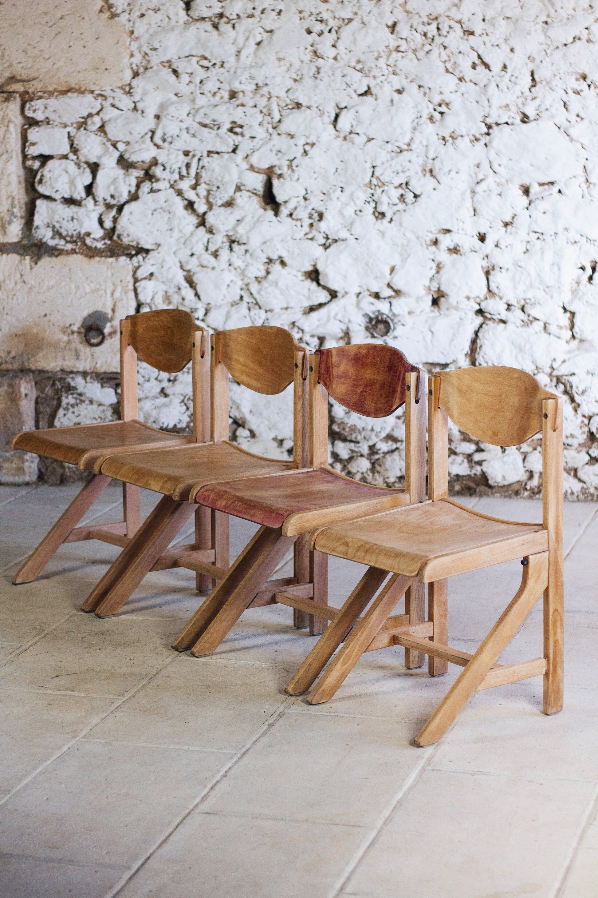 4 vintage canteen chairs in beech, 1980.
