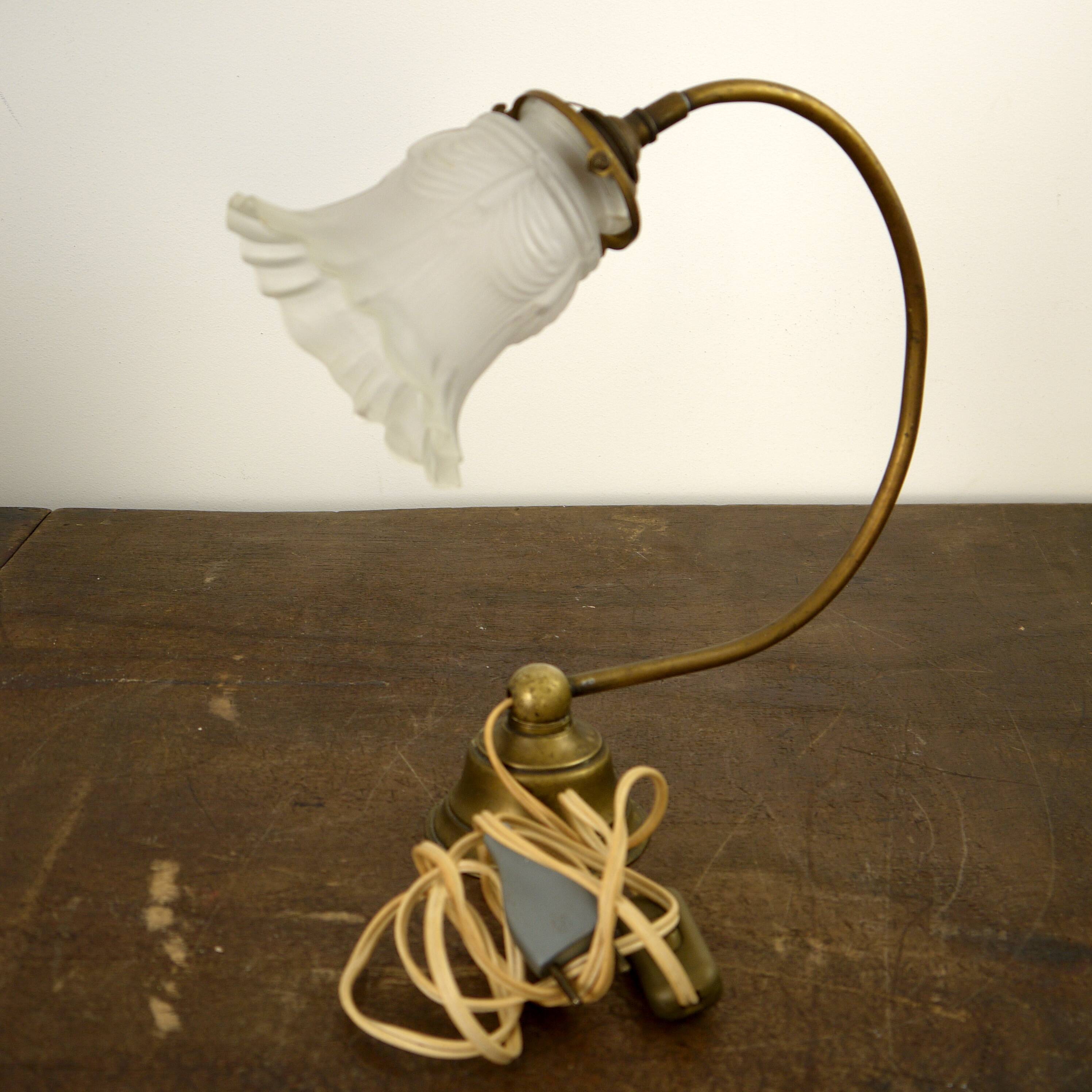 Brass lamp with glass globe