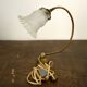 Brass lamp with glass globe