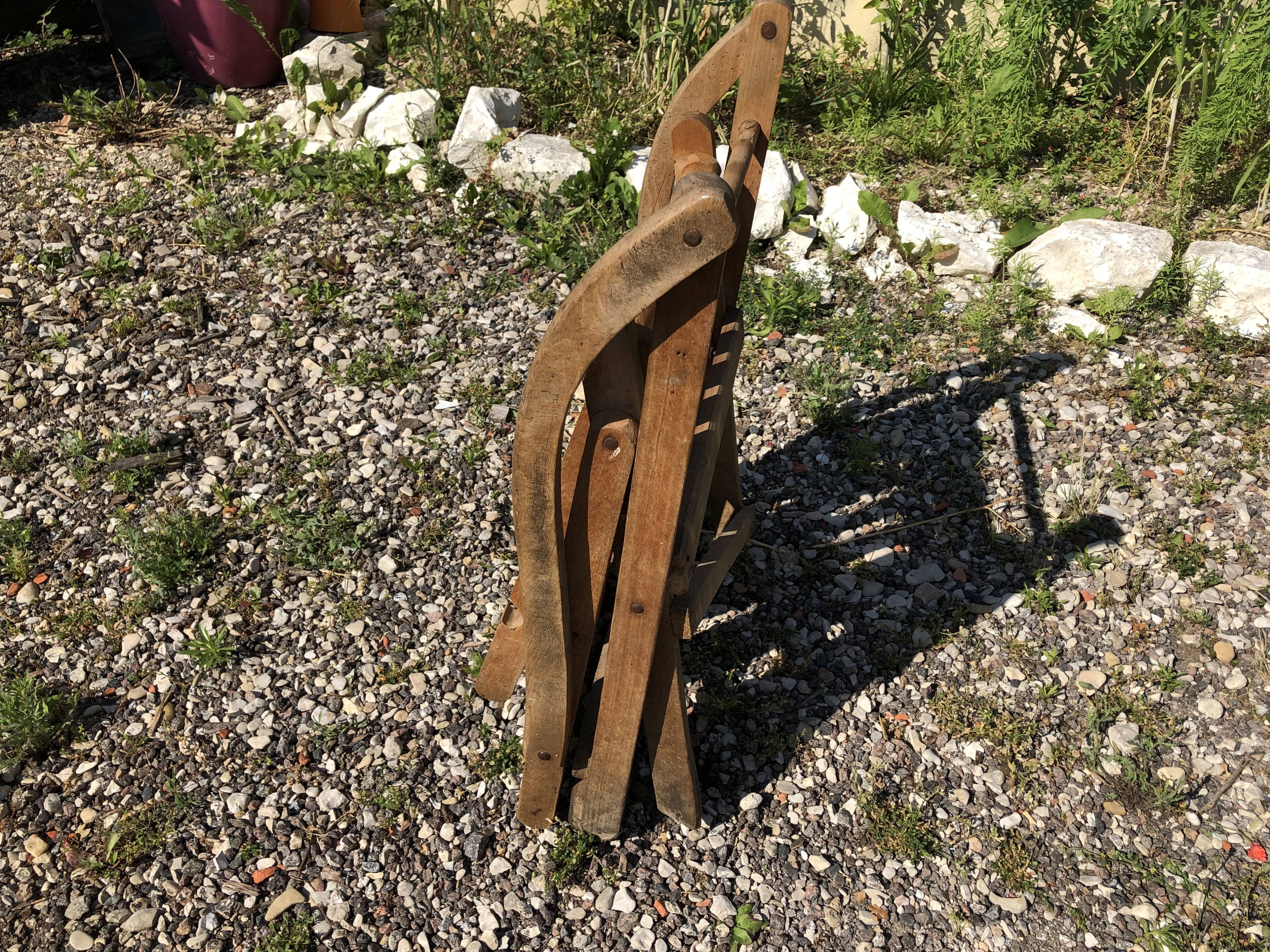 Old folding armchair wooden sitting vintage