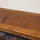 Cherry wood desk with a leather top.