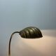 French table lamp in brass with a shell-shaped shade from the 1950s.