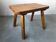 Table basse brutaliste en bois massif