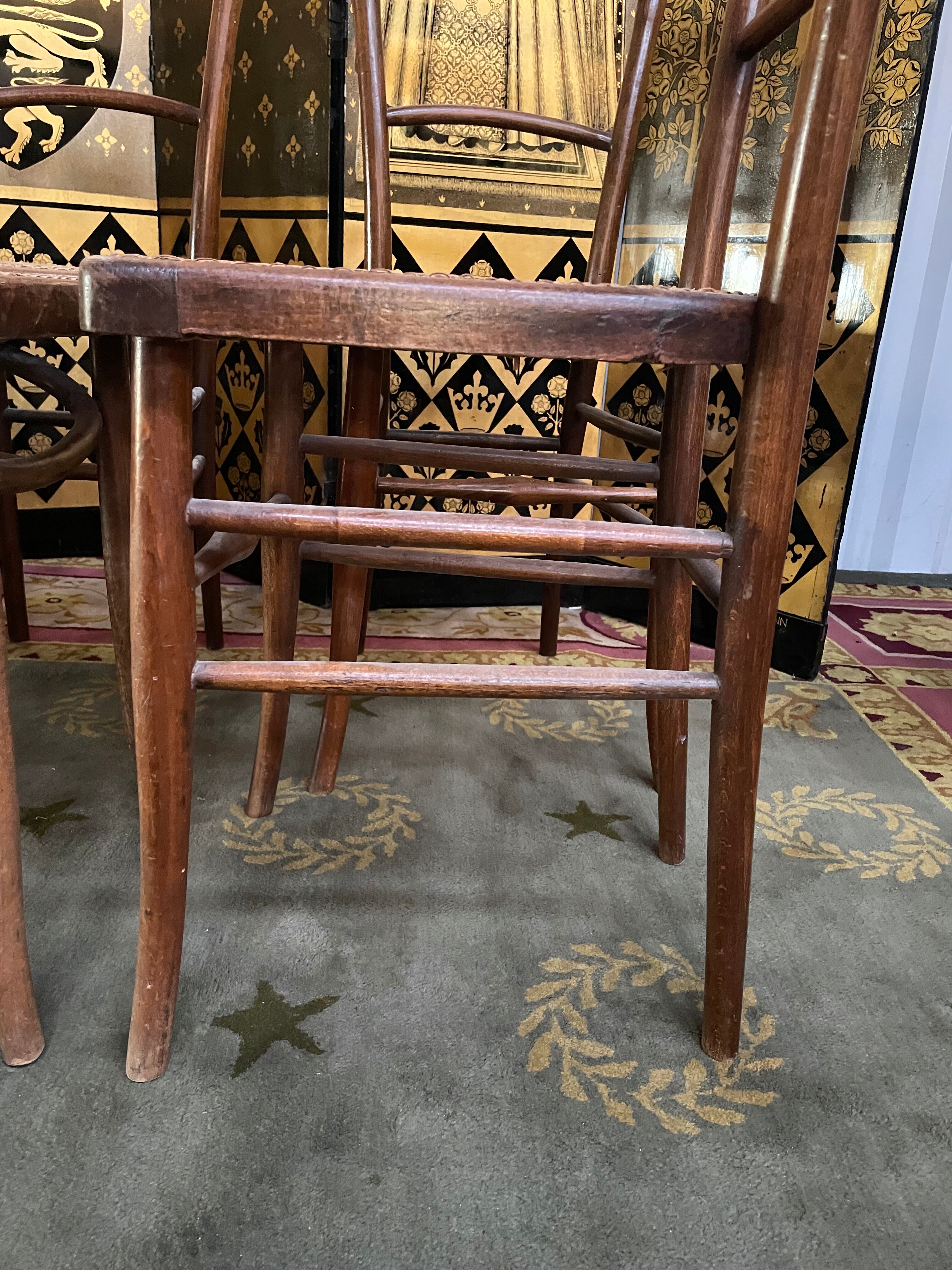 Suite of 10 bistro chairs in cannage