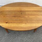 8-legged ash table with 6 extensions.