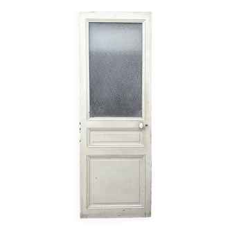 Porte ancienne de 1890 en bois massif avec vitre translucide en haut