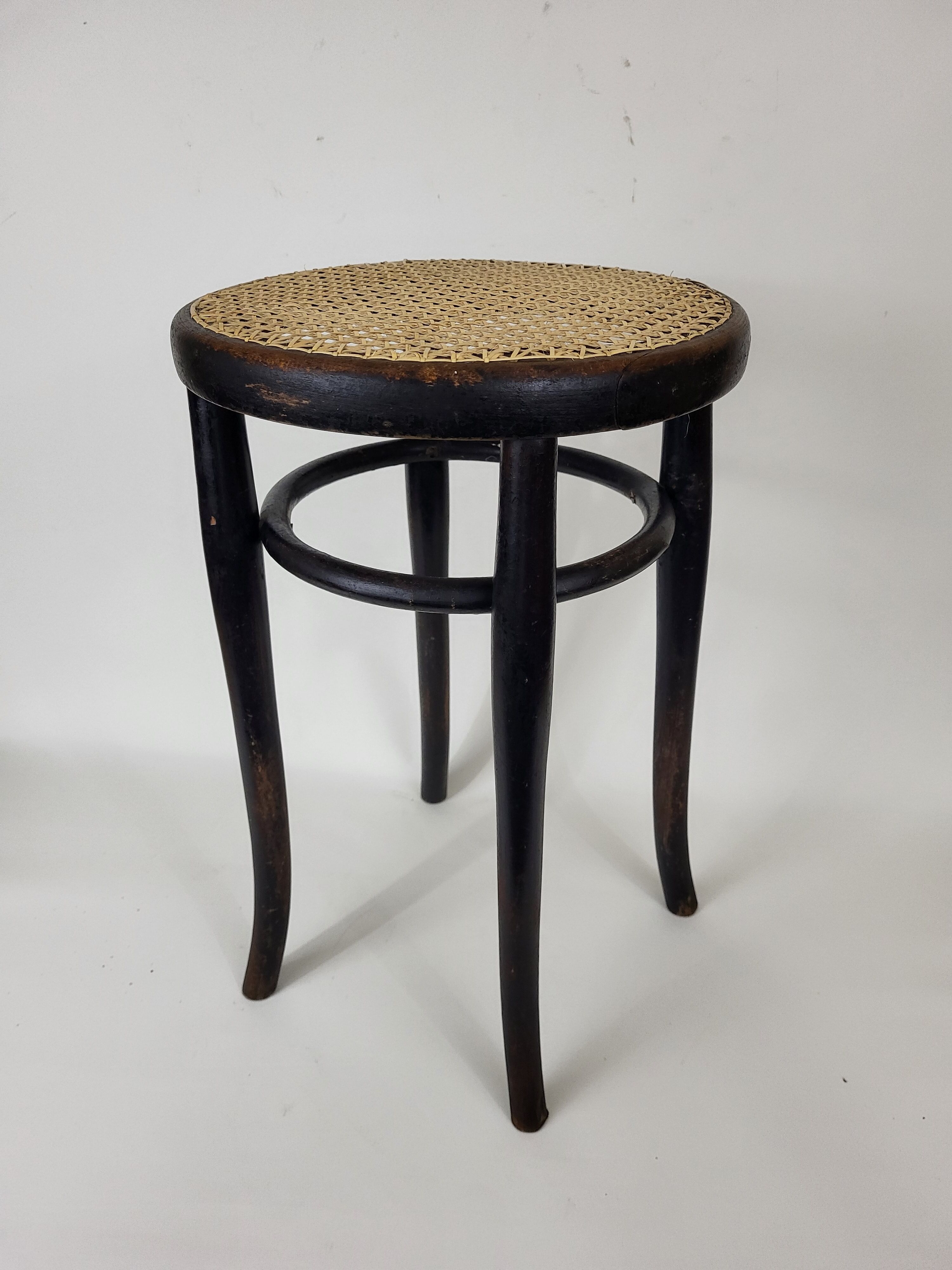 Blackened curved wooden stool Thonet