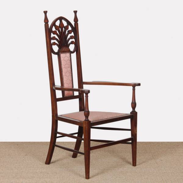 English armchair attributed to J.S. Henry, late 19th century.