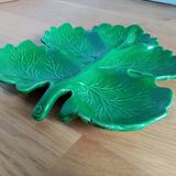 empty compartmentalized flat leaf-shaped pocket