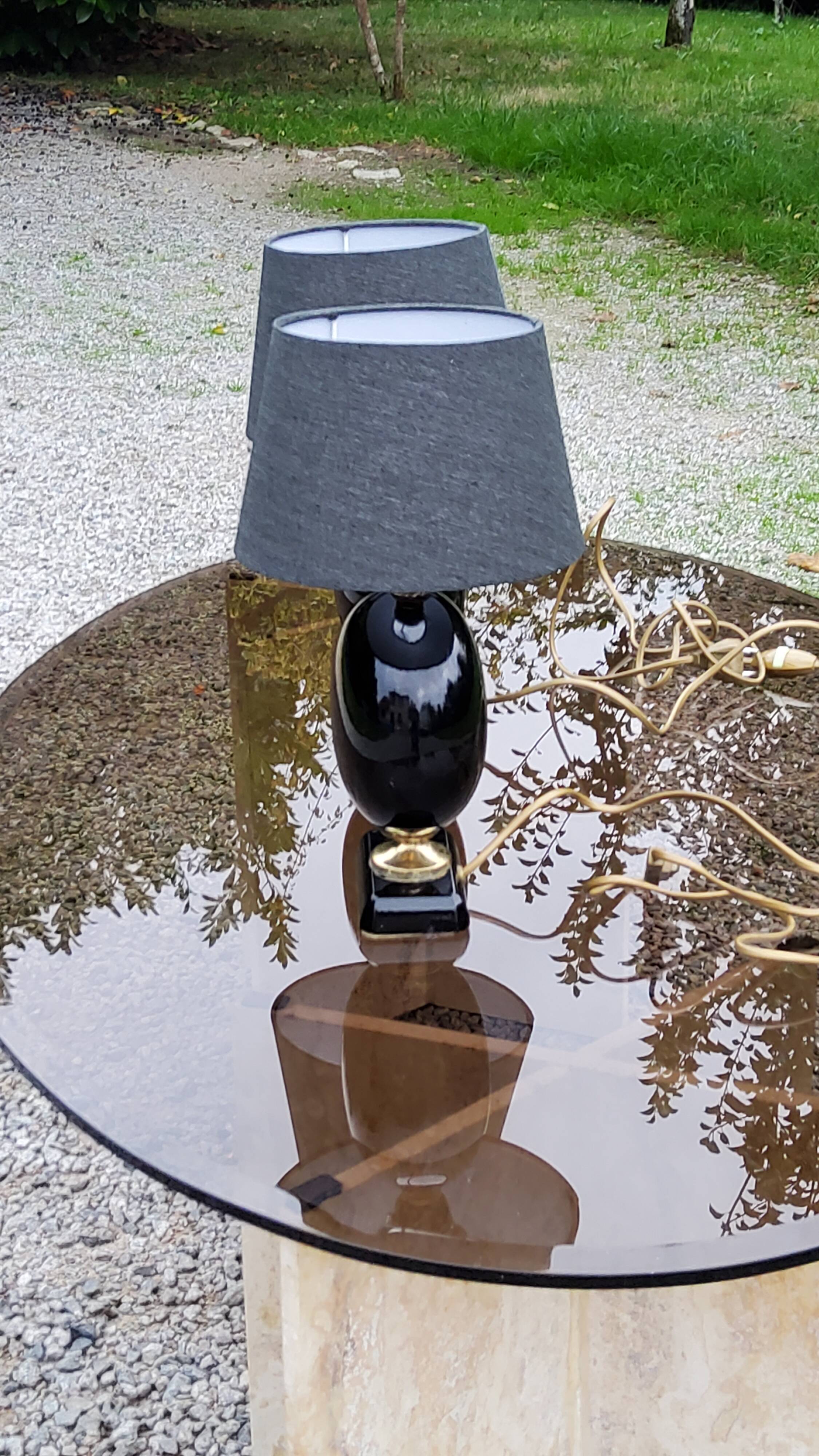 Pair of 70s designer lamps in black ceramic and gold metal