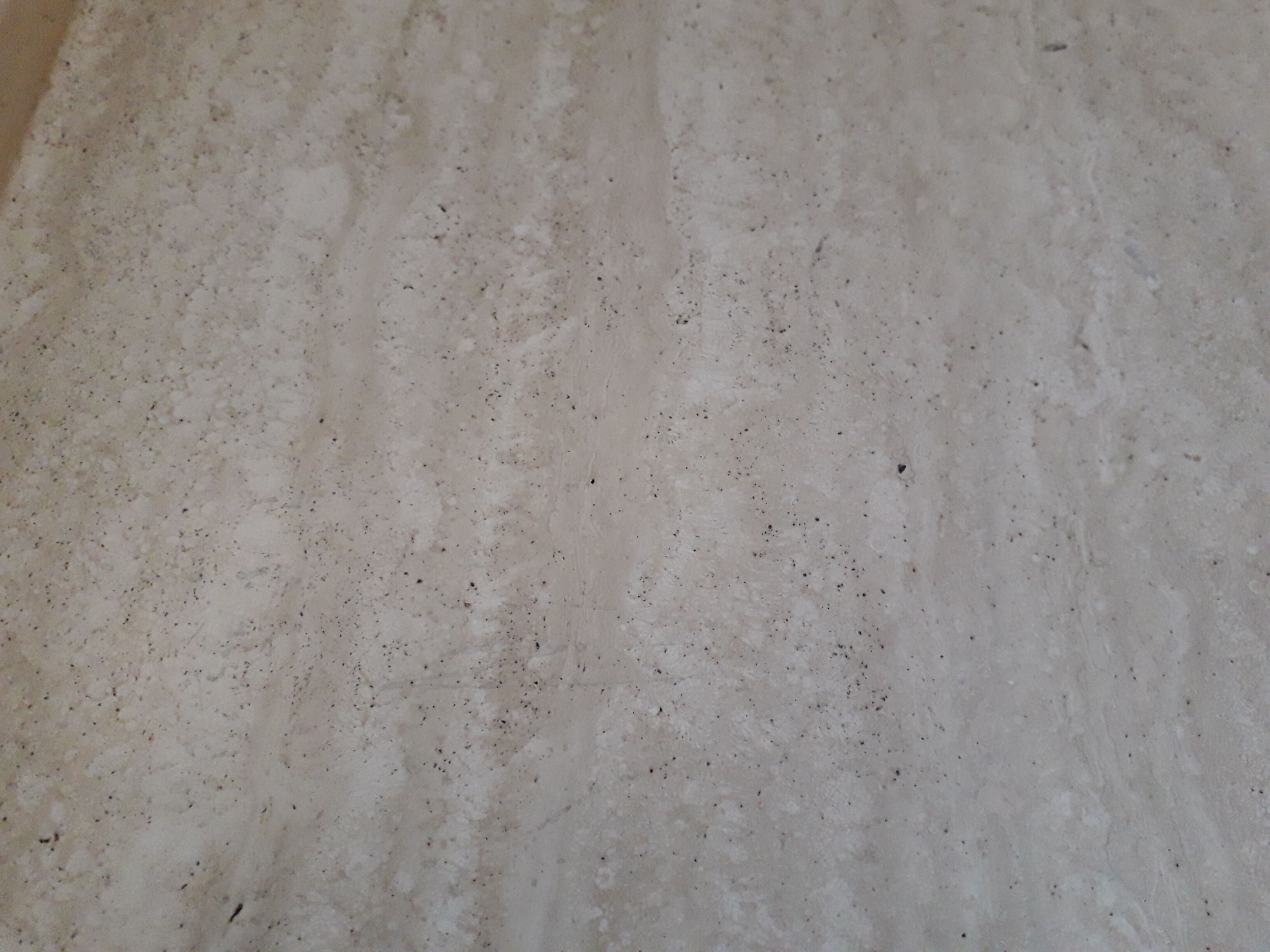 Coffee table in travertine