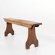Rustic natural oak wooden bench with rounded details, France ca. 1900