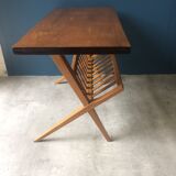 Coffee table, magazine rack with compass feet