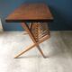 Coffee table, magazine rack with compass feet