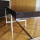 B&B Italia Maxalto - Athos table in wenge, chrome legs - design by Paola Piva.
